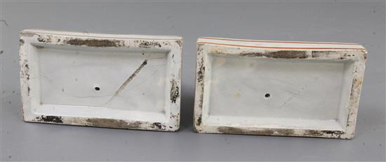 A pair of Wood & Caldwell pearlware models of recumbent lions, c.1800, l. 12.5cm, slight damage